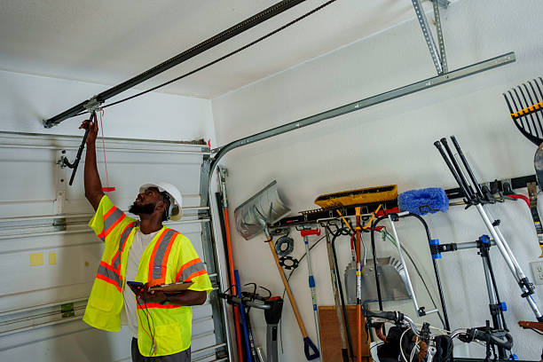 Professional Garage Door Off Track Repair technician working in New Johnsonville, TN